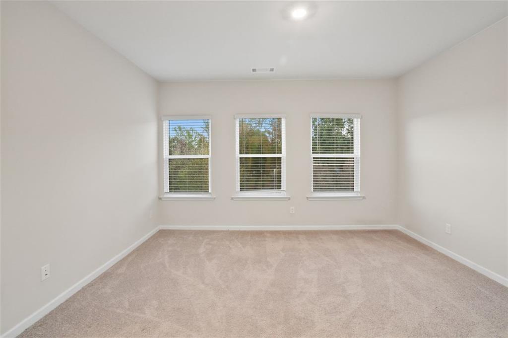 26 Peeples Drive Lawrenceville, GA 30046 - Photo 17 of 24 an empty room with windows