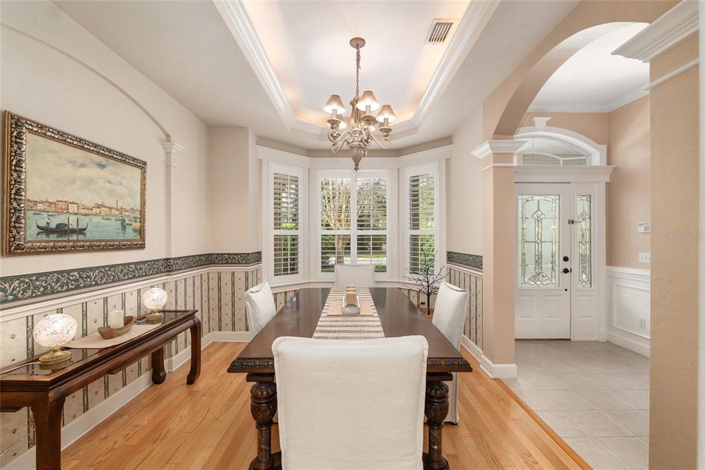 9513 Southwest 33 Lane Gainesville, FL 32608 - Photo 12 of 68 a living room with furniture and a large window