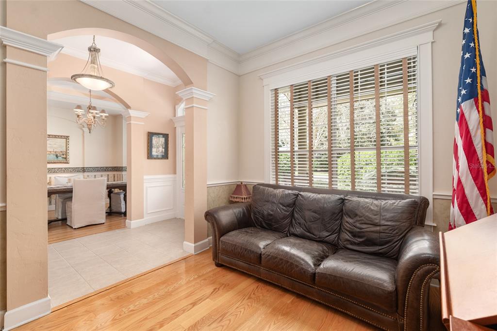 9513 Southwest 33 Lane Gainesville, FL 32608 - Photo 16 of 68 a living room with furniture and a large window