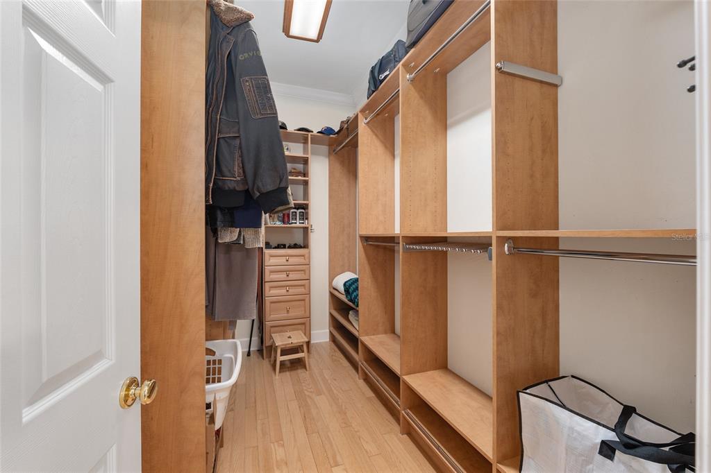 9513 Southwest 33 Lane Gainesville, FL 32608 - Photo 41 of 68 a view of walk in closet with clothes and shoes