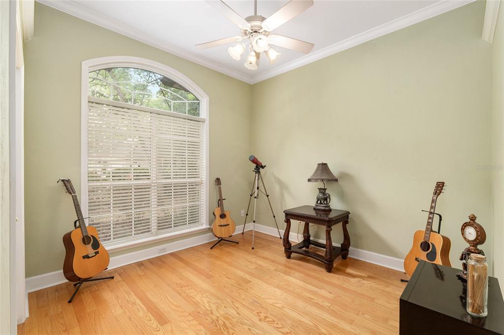 9513 Southwest 33 Lane Gainesville, FL 32608 - Photo 42 of 68 a view of a room with gym equipment