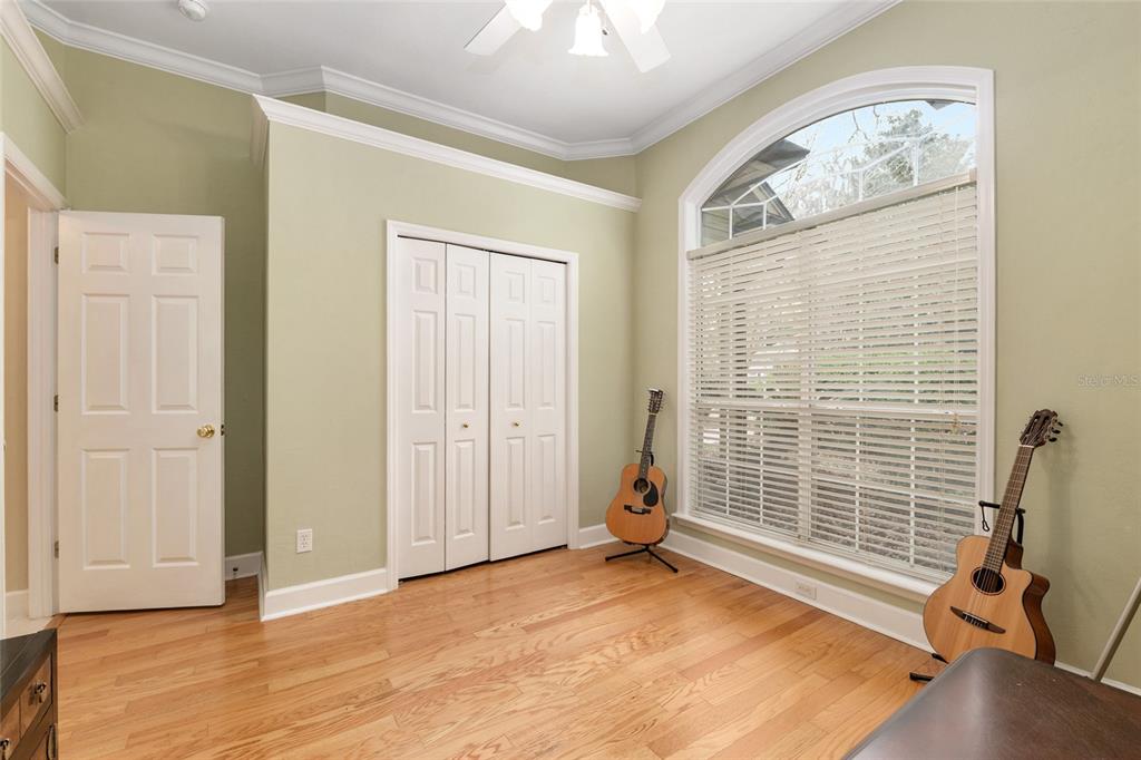 9513 Southwest 33 Lane Gainesville, FL 32608 - Photo 43 of 68 a view of an empty room with a window