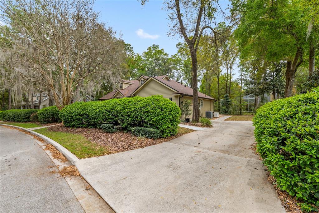 9513 Southwest 33 Lane Gainesville, FL 32608 - Photo 67 of 68 a view of a house with a street