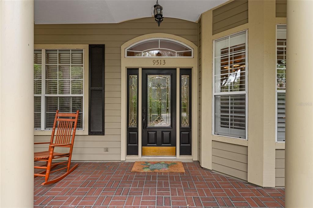 9513 Southwest 33 Lane Gainesville, FL 32608 - Photo 9 of 68 a view of a entryway door of the house