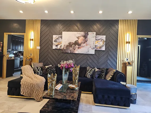 a view of a kitchen with a sink and a window