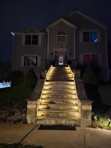 a view of a backyard with sitting area
