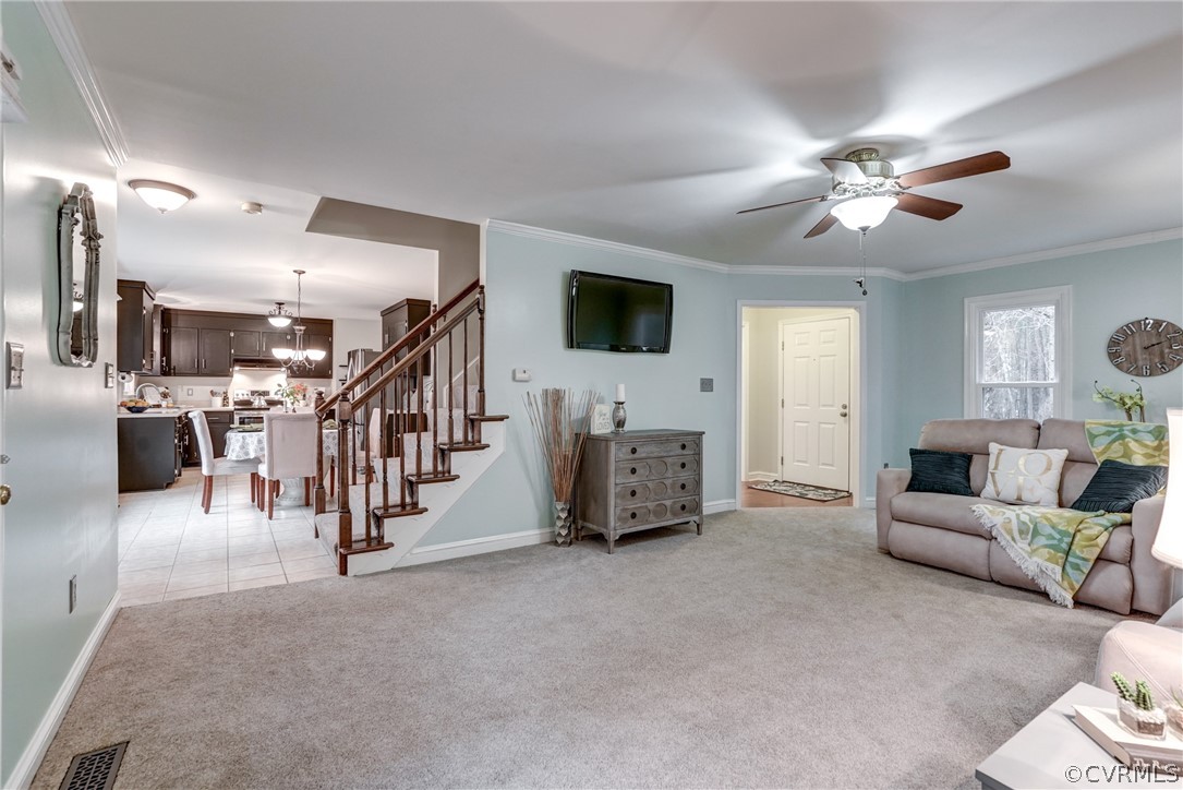 1152 Timber Trace Road Powhatan, VA 23139 - Photo 5 of 38 The living room wraps around to the bright, eat-in