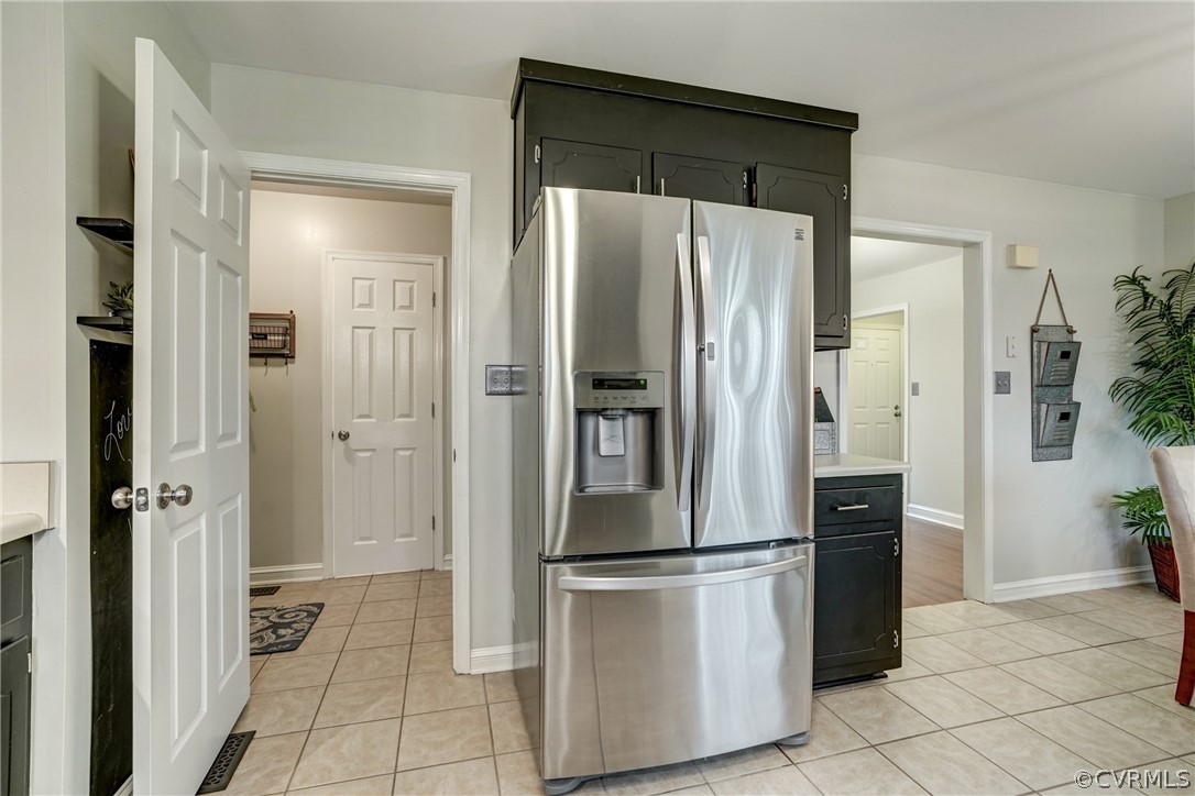 1152 Timber Trace Road Powhatan, VA 23139 - Photo 10 of 38 The kitchen opens to both the dining room (on the
