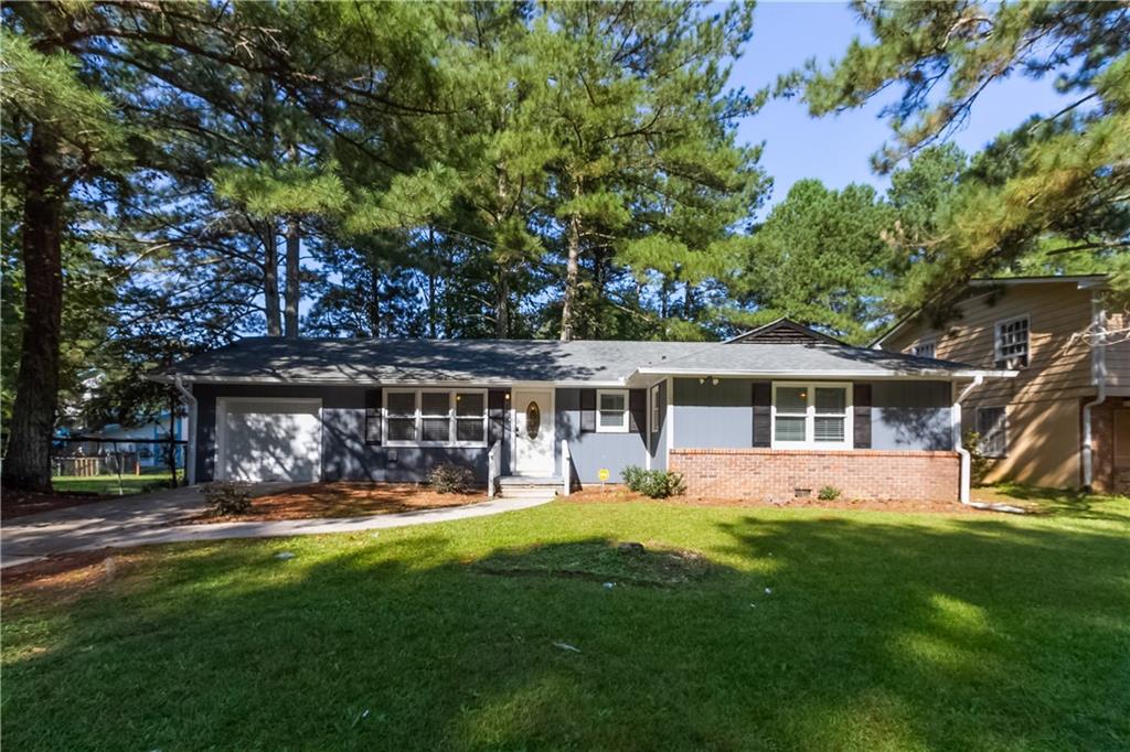 379 Wilson Mill Road Southwest Atlanta, GA 30331 - Photo 1 of 1 a view of a house with a yard porch and sitting area