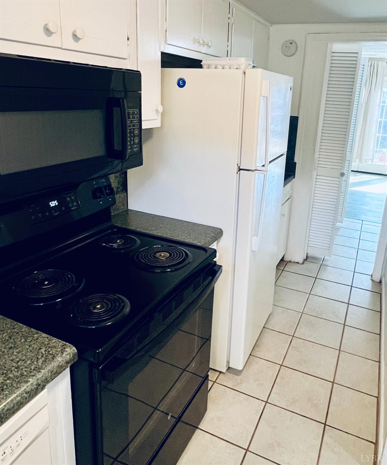 3101 Link Road, Unit 36 Lynchburg, VA 24503 - Photo 15 of 39 a kitchen with a stove and a refrigerator