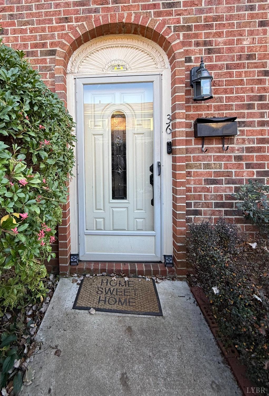 3101 Link Road, Unit 36 Lynchburg, VA 24503 - Photo 2 of 39 a front view of a house with a yard