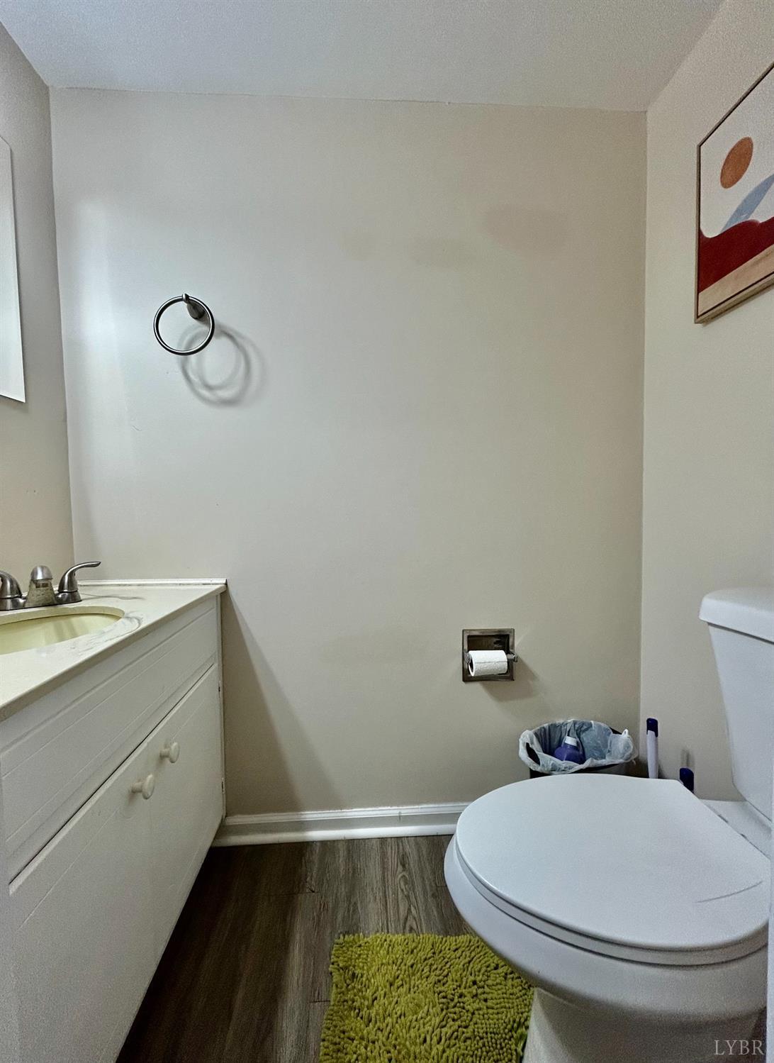 3101 Link Road, Unit 36 Lynchburg, VA 24503 - Photo 22 of 39 a bathroom with a toilet a sink and mirror