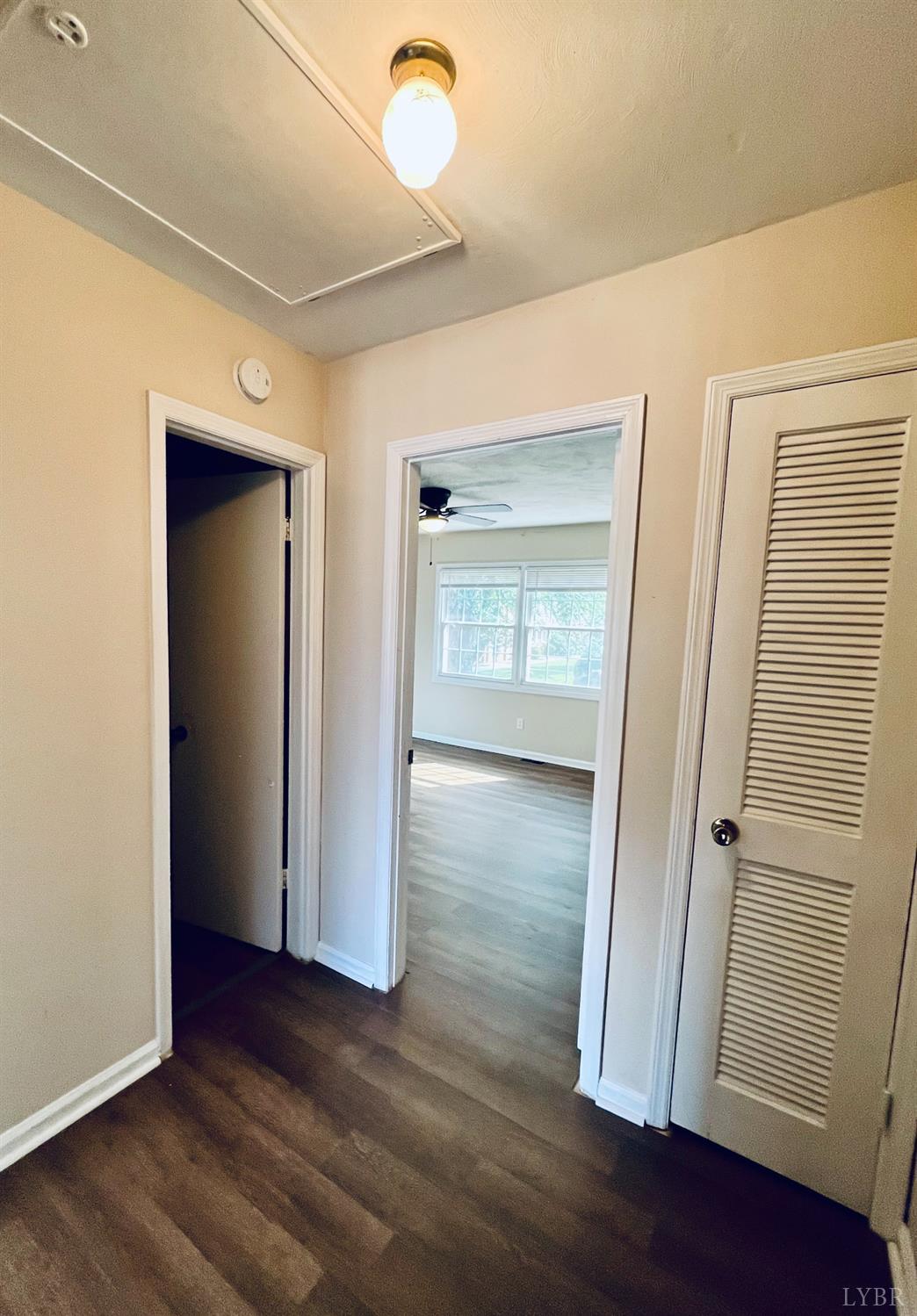 3101 Link Road, Unit 36 Lynchburg, VA 24503 - Photo 23 of 39 an empty room with wooden floor and door