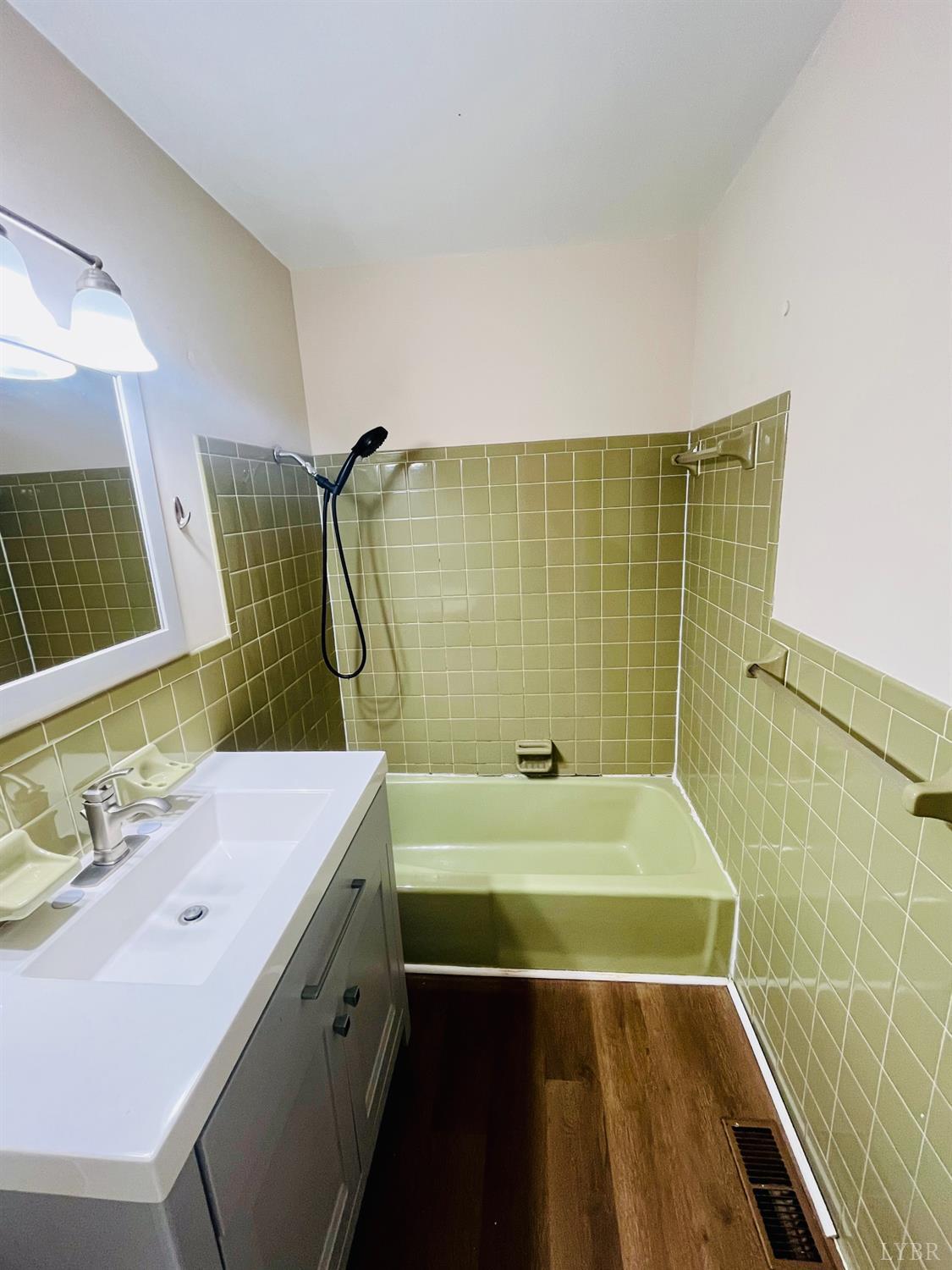 3101 Link Road, Unit 36 Lynchburg, VA 24503 - Photo 24 of 39 a bathroom with a sink and a mirror
