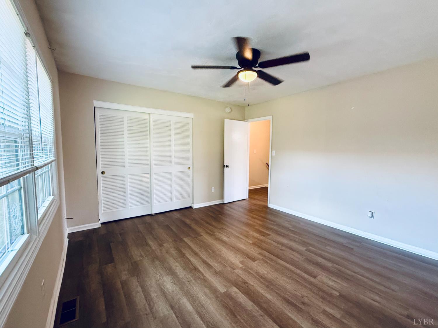 3101 Link Road, Unit 36 Lynchburg, VA 24503 - Photo 27 of 39 wooden floor in an empty room with a window
