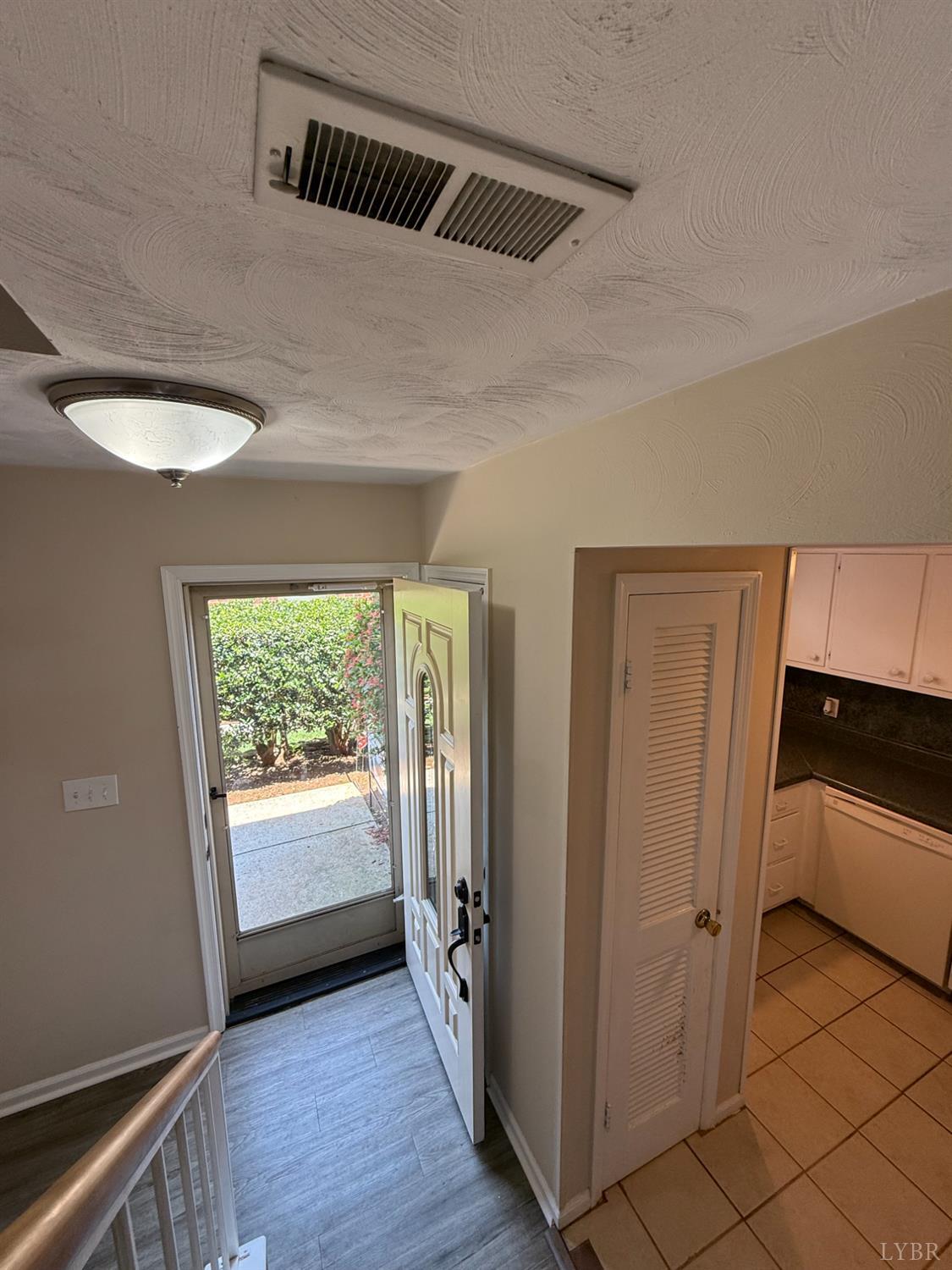 3101 Link Road, Unit 36 Lynchburg, VA 24503 - Photo 4 of 39 a view of a hallway to rooms and stairs