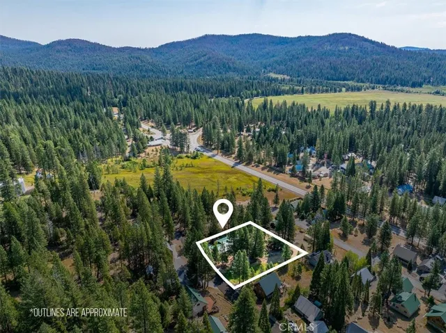 a view of a mountain with a yard and mountain