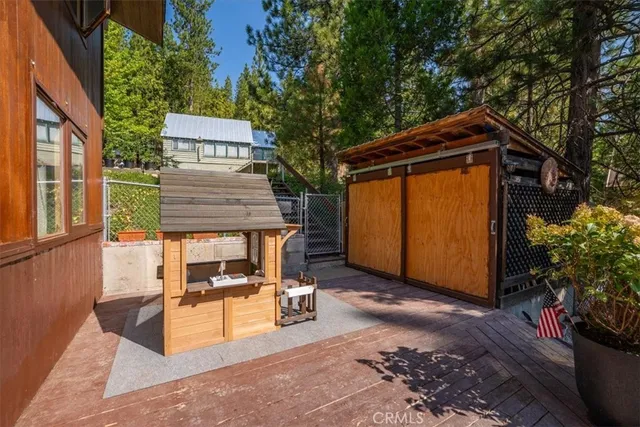a view of a backyard with sitting area and furniture
