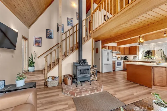a living room with furniture and flat screen tv