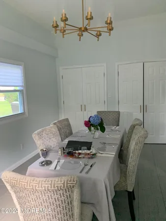 a view of a dining room with furniture