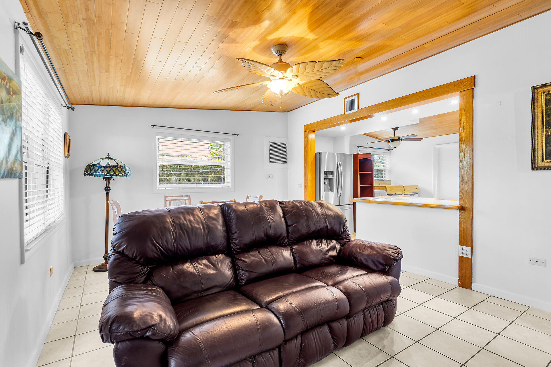 13 Bass Avenue Key Largo, FL 33037 - Photo 8 of 43 a living room with furniture and a large window