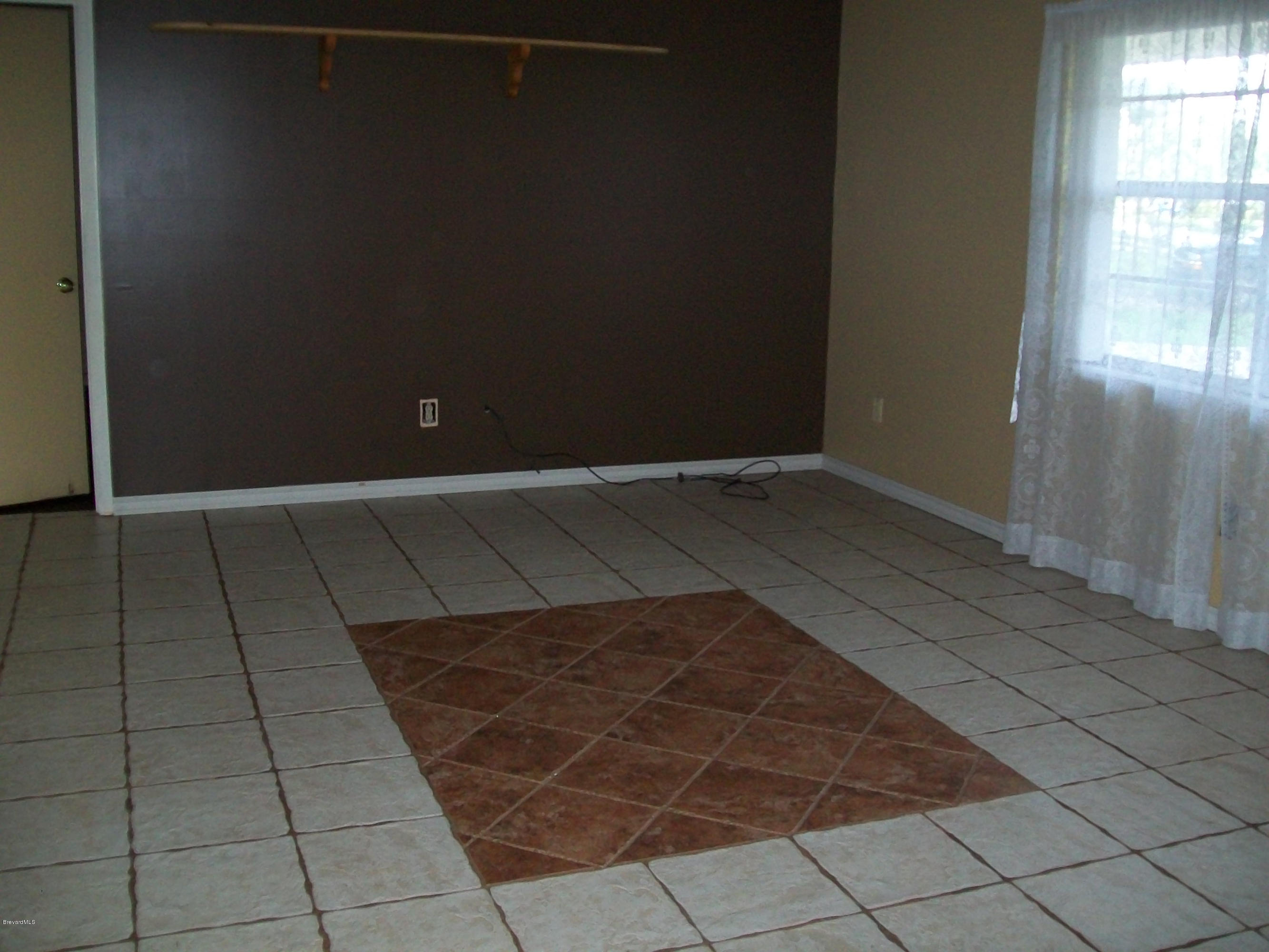 2777 Rheims Avenue Melbourne, FL 32935 - Photo 11 of 20 living room view 2
