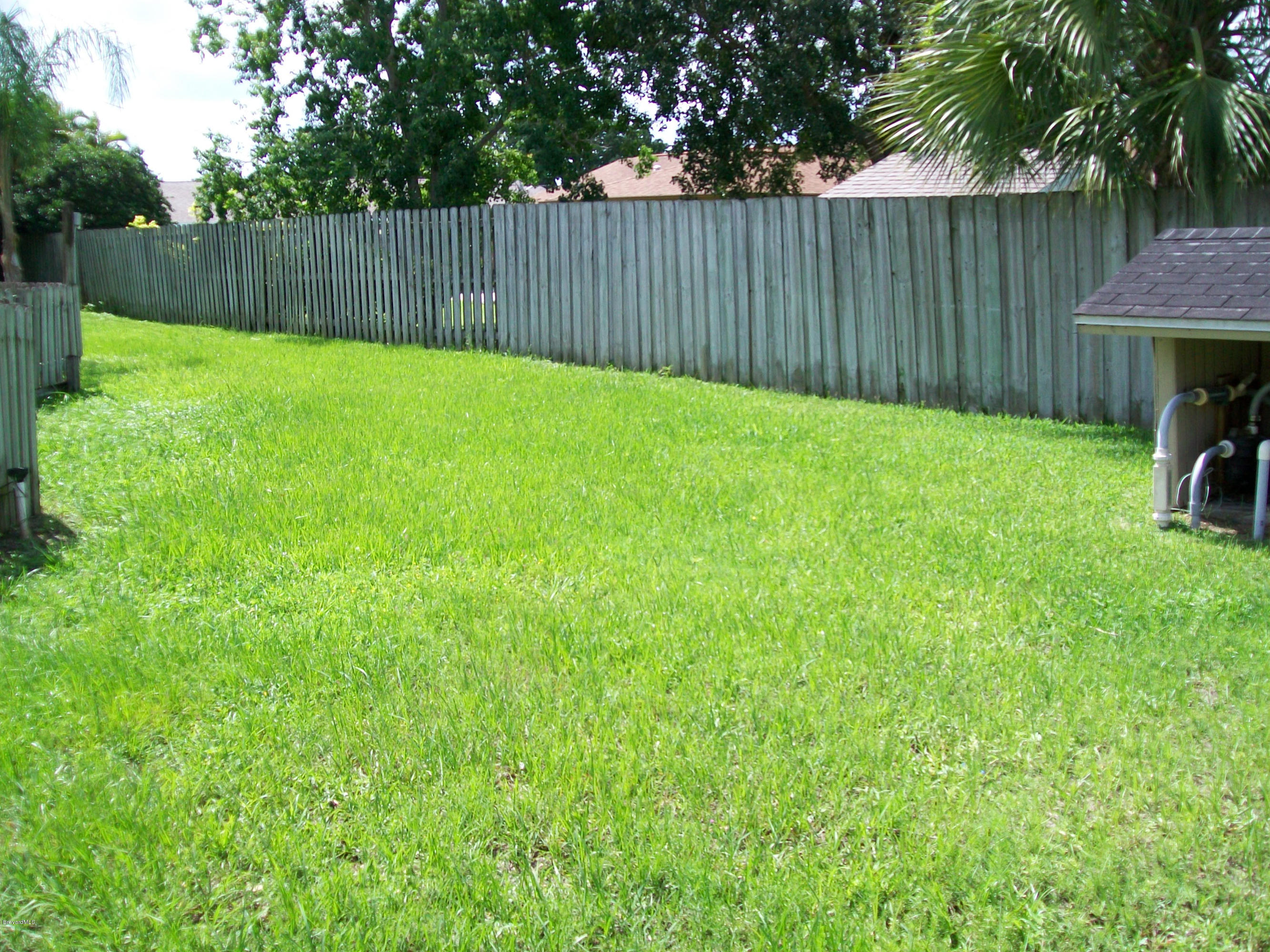 2777 Rheims Avenue Melbourne, FL 32935 - Photo 15 of 20 side yard
