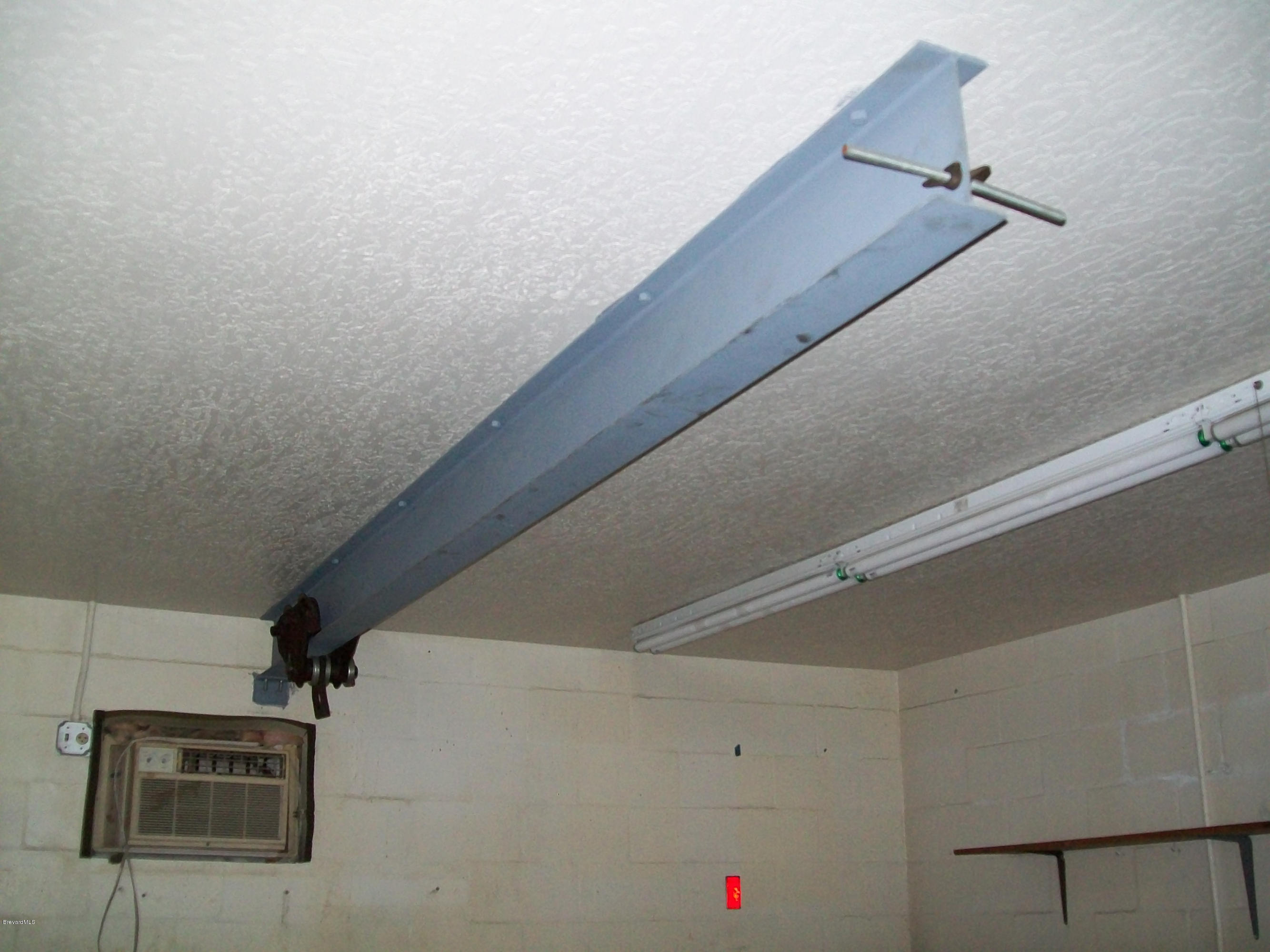 2777 Rheims Avenue Melbourne, FL 32935 - Photo 17 of 20 Engine lift in garage