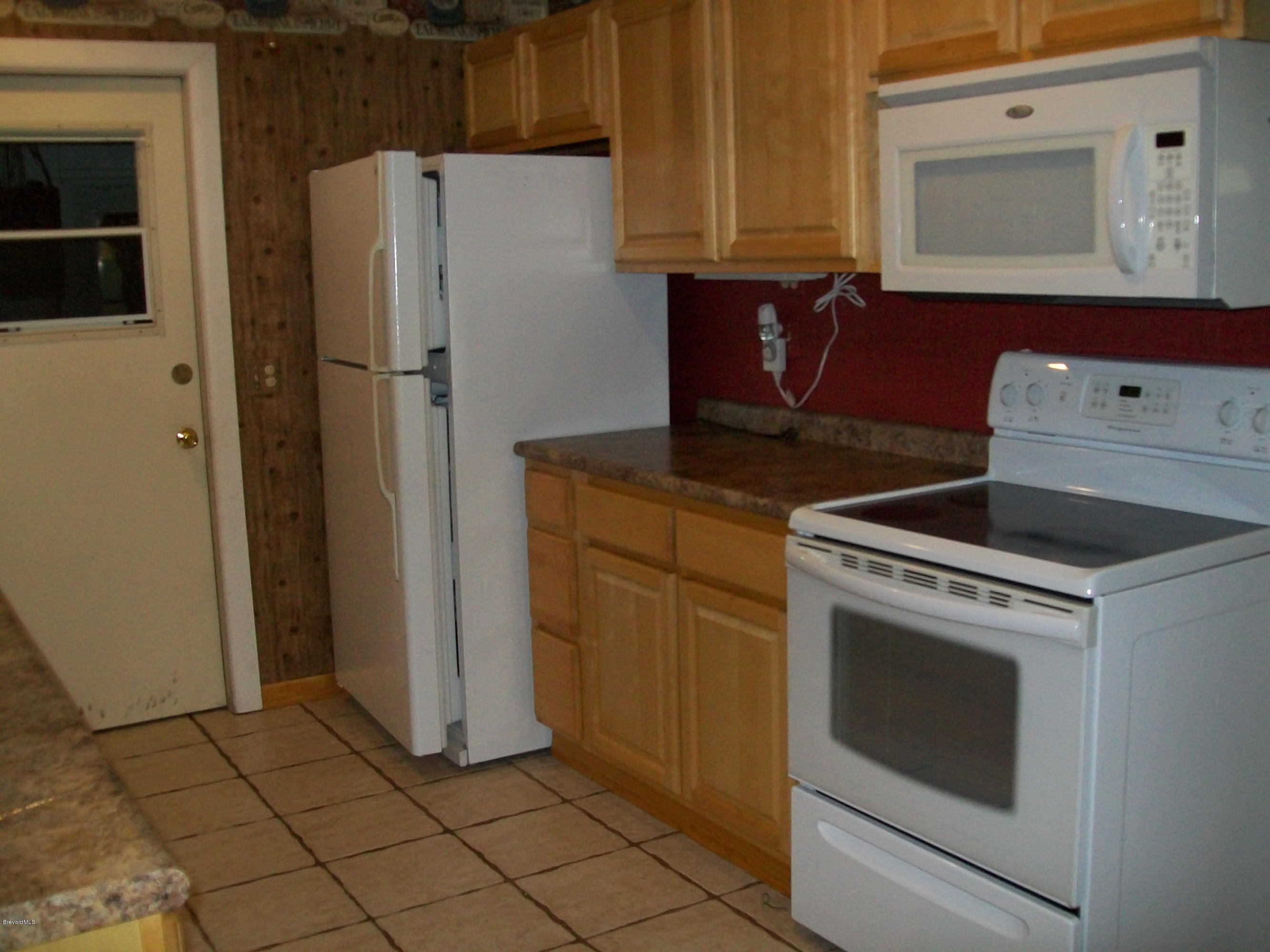 2777 Rheims Avenue Melbourne, FL 32935 - Photo 3 of 20 kitchen 2