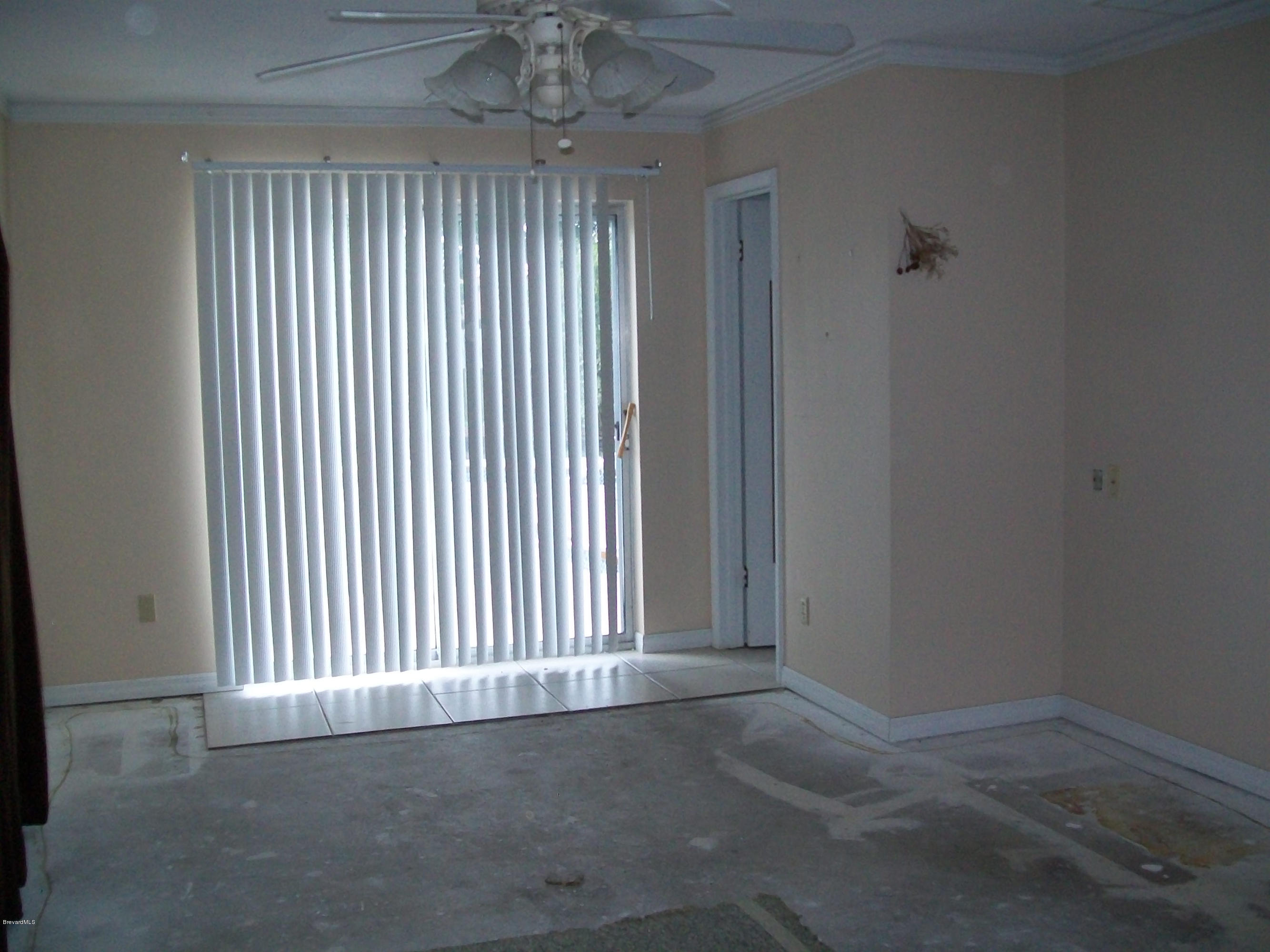 2777 Rheims Avenue Melbourne, FL 32935 - Photo 6 of 20 No flooring in master bedroom