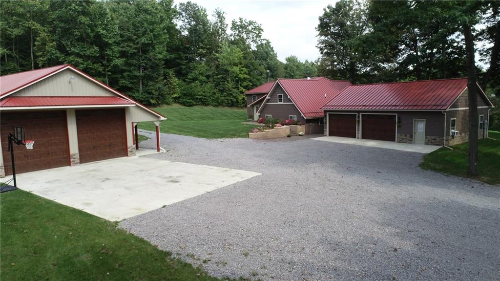 1213 Sunol Road Cochranton, PA 16314 - Photo 2 of 25 a view of a house with a yard and large tree