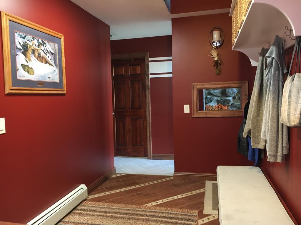 1213 Sunol Road Cochranton, PA 16314 - Photo 16 of 25 a bedroom with wooden floor and a large window