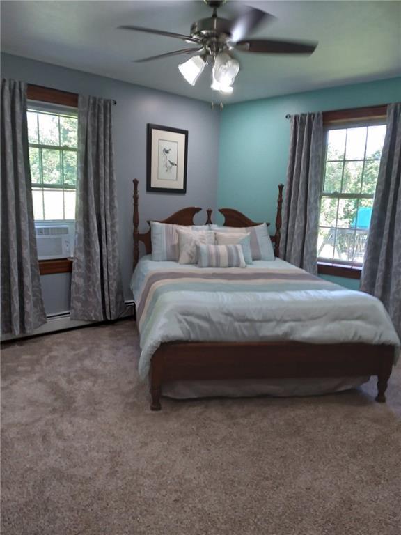 1213 Sunol Road Cochranton, PA 16314 - Photo 20 of 25 a large bed sitting in a bedroom next to a window