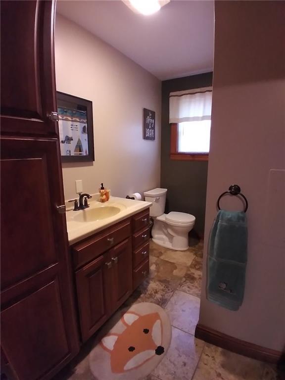 1213 Sunol Road Cochranton, PA 16314 - Photo 21 of 25 a bathroom with a sink mirror and toilet