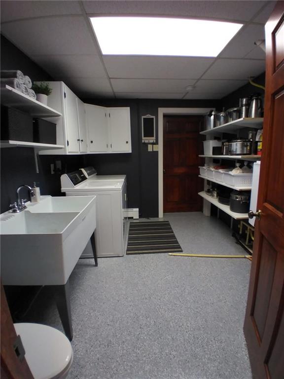 1213 Sunol Road Cochranton, PA 16314 - Photo 25 of 25 a utility room with a sink a washer and dryer