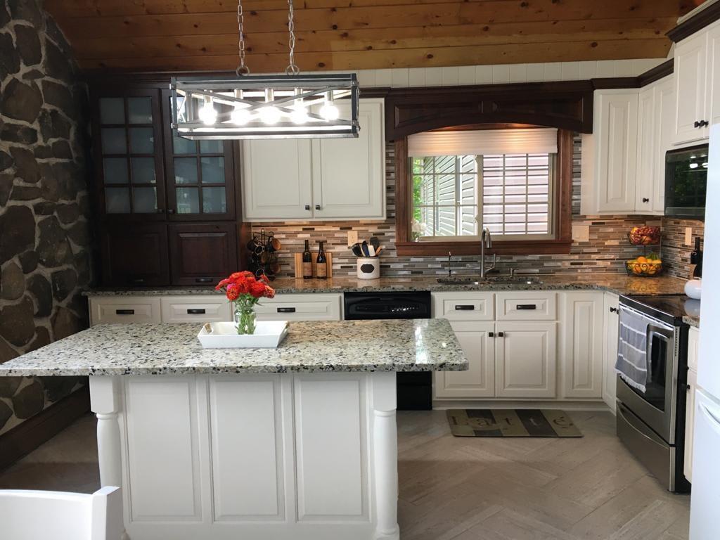 1213 Sunol Road Cochranton, PA 16314 - Photo 6 of 25 a kitchen with granite countertop a sink stove and cabinets