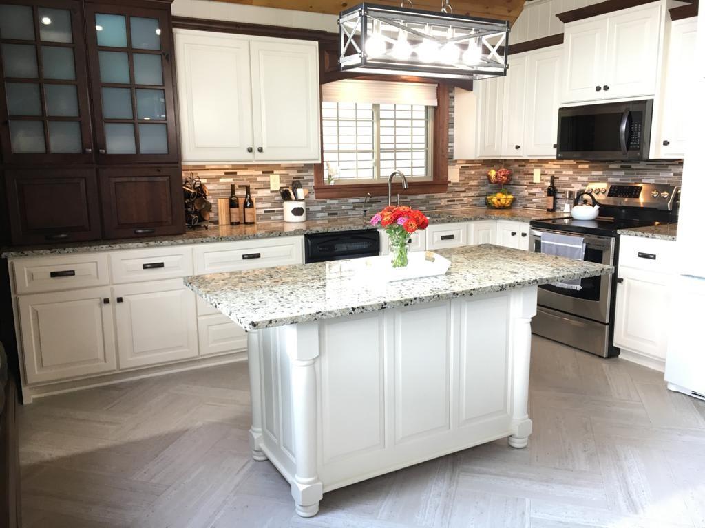 1213 Sunol Road Cochranton, PA 16314 - Photo 7 of 25 a kitchen with granite countertop a sink stove top oven and microwave