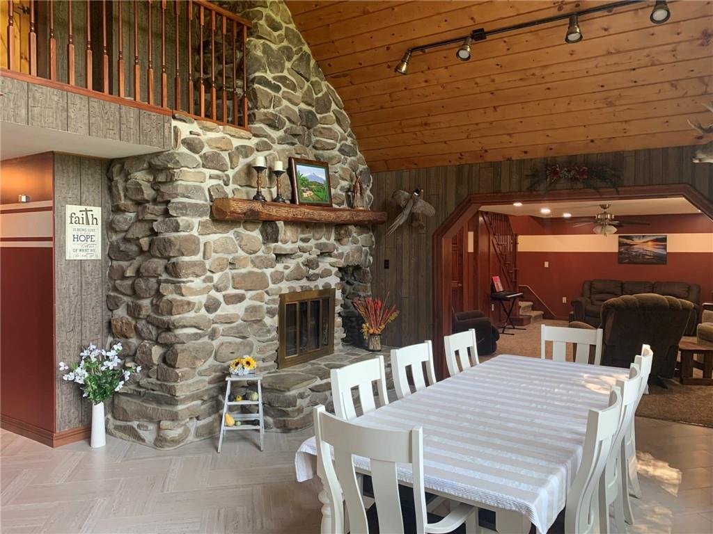 1213 Sunol Road Cochranton, PA 16314 - Photo 9 of 25 a view of a patio with table and chairs with potted plants
