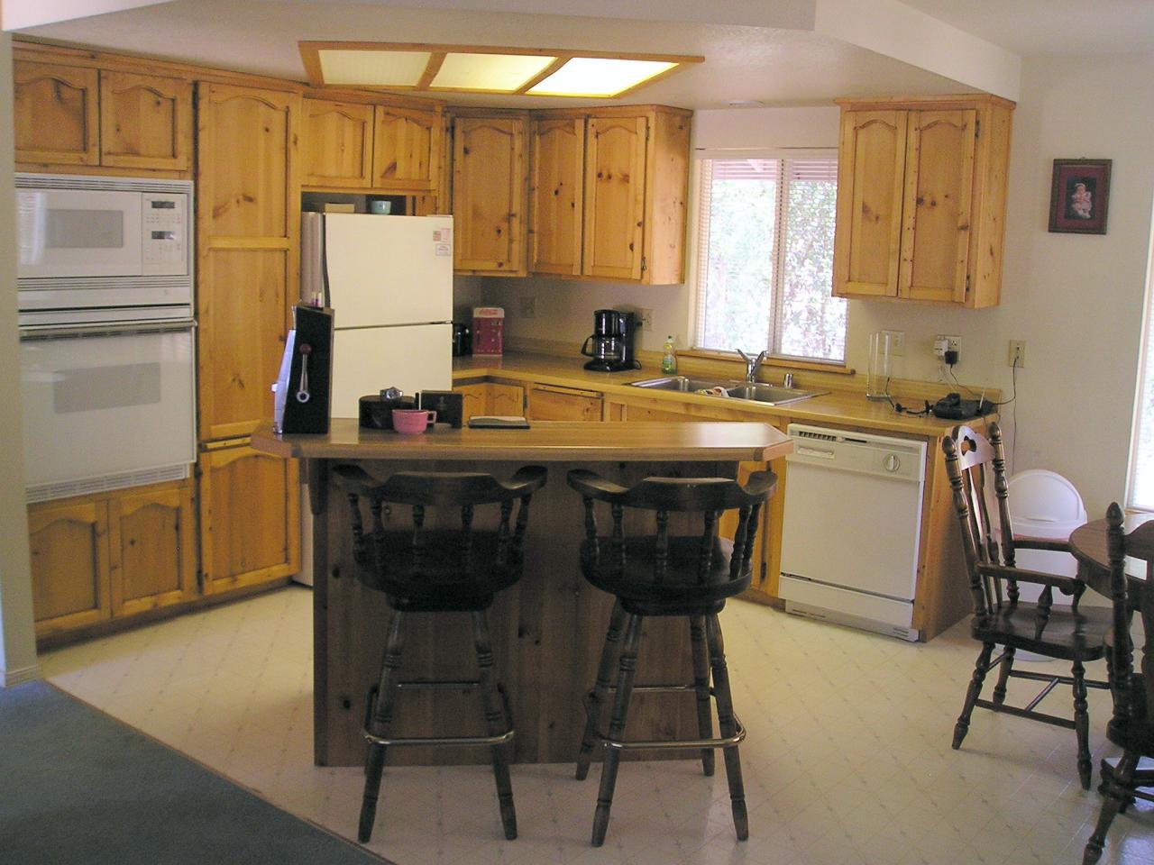 21277 Old Alturas Road Redding, CA 96003 - Photo 5 of 6 custom knotty pine cabinetry in kitchen