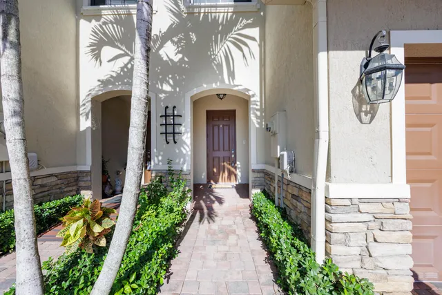 a front view of a house with a porch