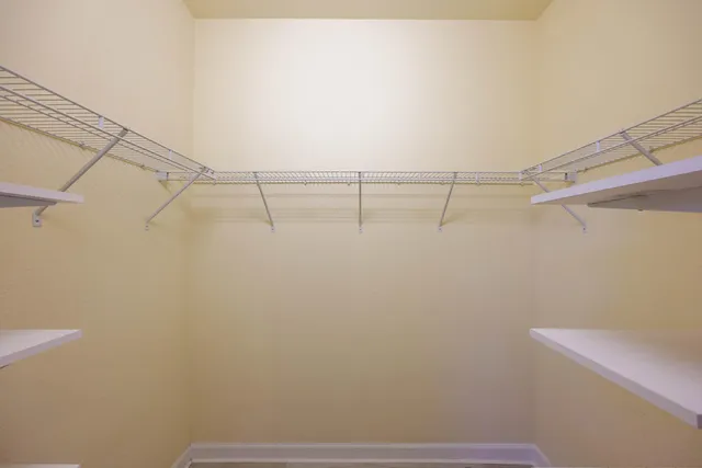 a view of a room with racks on the wall