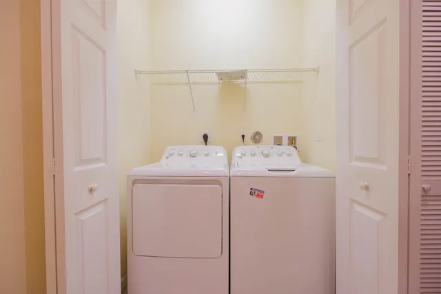 a utility room with dryer and washer