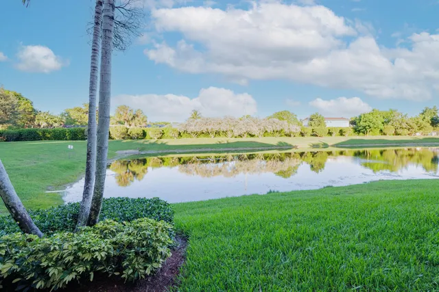 a view of a lake with a big yard