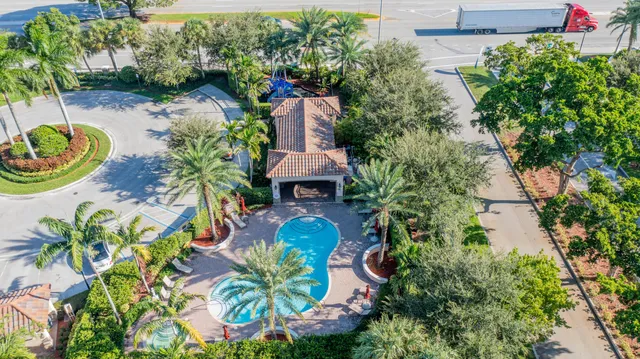 an aerial view of a house with outdoor space