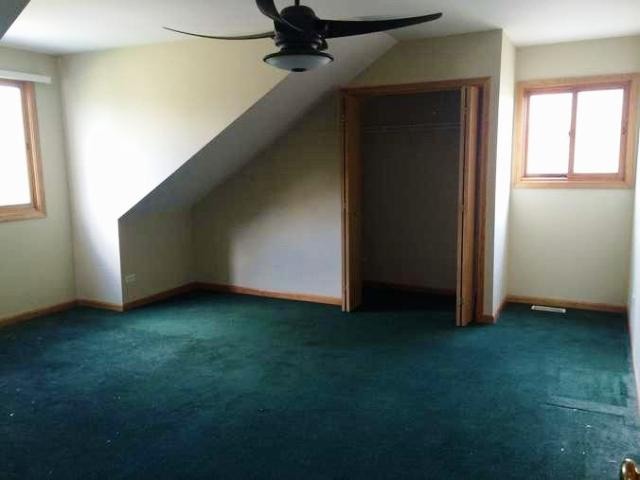 4852 Snapjack Circle Naperville, IL 60564 - Photo 6 of 8 an empty room with windows