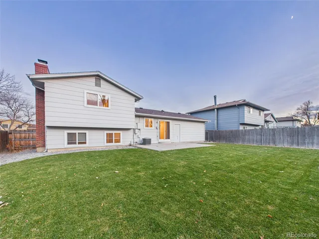 a view of backyard with green space