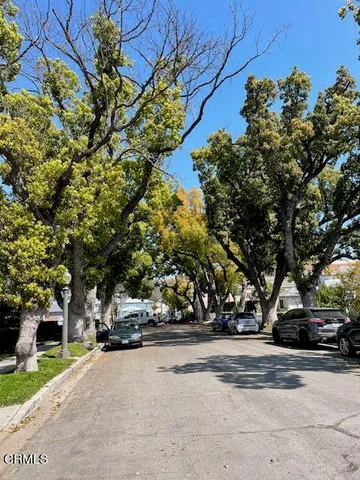 a view of road with trees