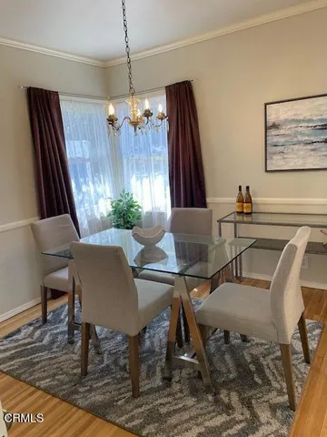 a view of a dining room with furniture