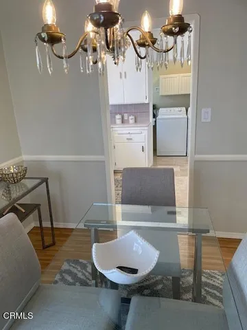 a bathroom with a sink mirror and toilet