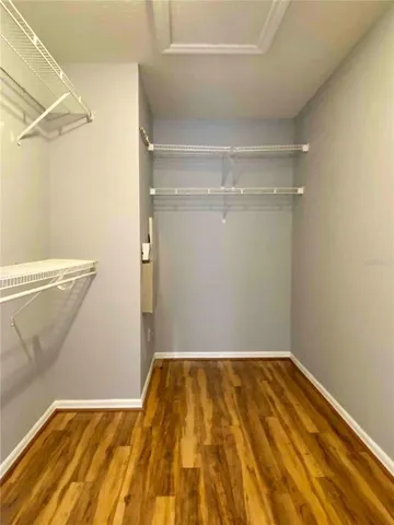 a bathroom with a double vanity sink a mirror and a